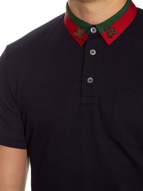 gucci bee embroidered polo shirt.